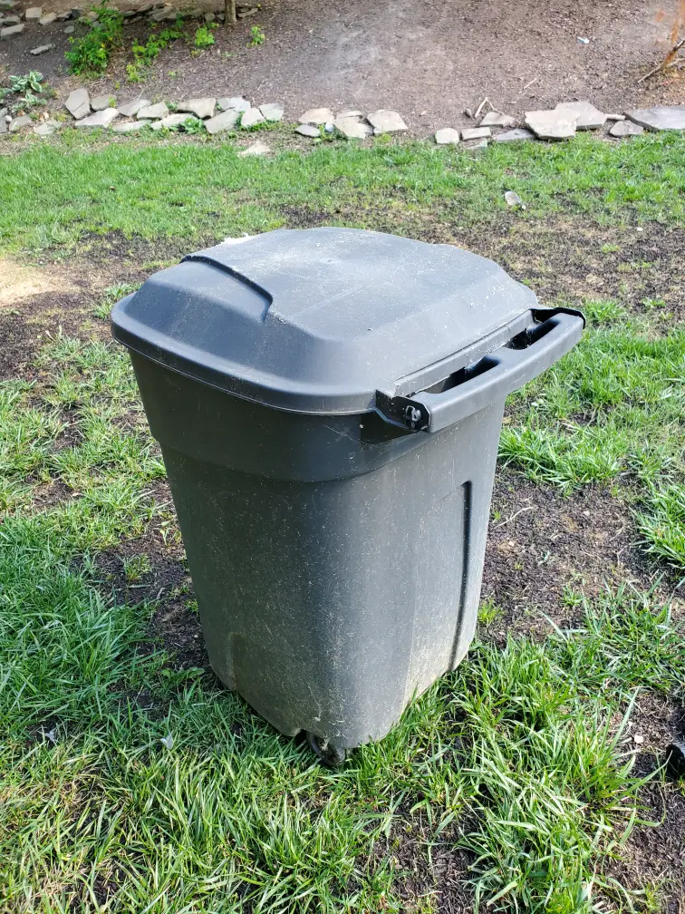 Garbage can compost bin.