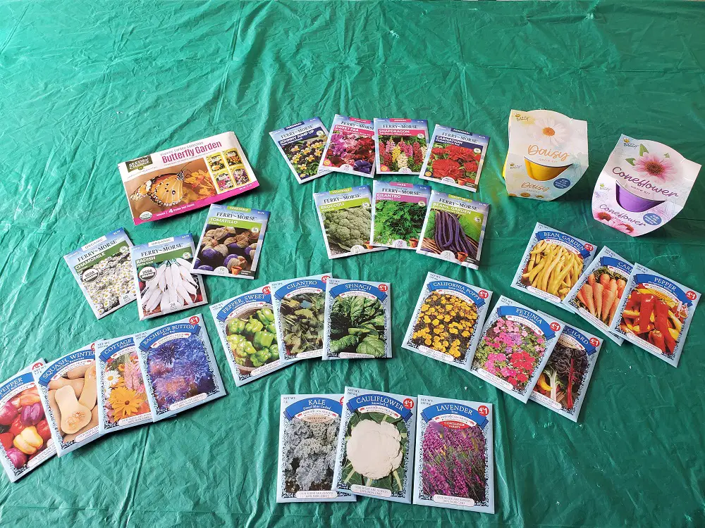 Seed packets spread across a table.